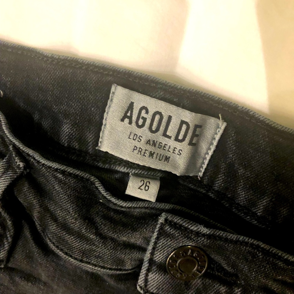 Agolde Black Stretch Denim with knee rips. Size 26